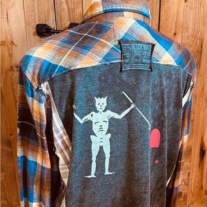 Distressed up cycled Rustic Outfitter flannel with Black Rifle Coffee Co. tshirt